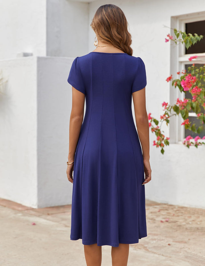 Belle robe midi femme – col rond, manches bouffantes et poches, ligne A élégante