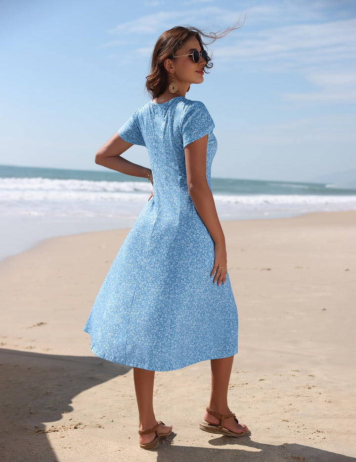Belle robe midi femme – col rond, manches bouffantes et poches, ligne A élégante
