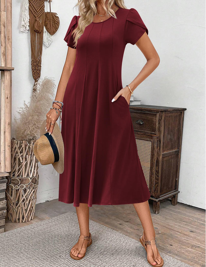 Belle robe midi femme – col rond, manches bouffantes et poches, ligne A élégante