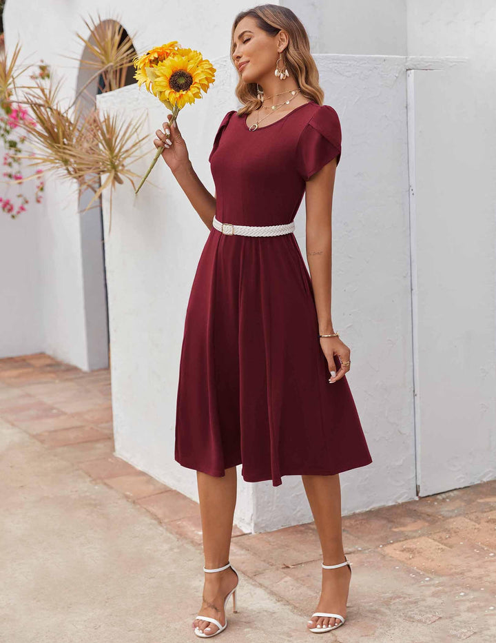 Belle robe midi femme – col rond, manches bouffantes et poches, ligne A élégante