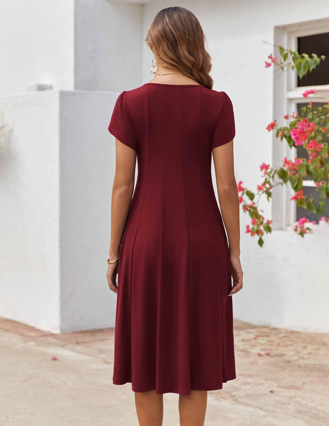 Belle robe midi femme – col rond, manches bouffantes et poches, ligne A élégante